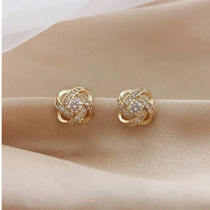 Spiral Flower Cross Earrings