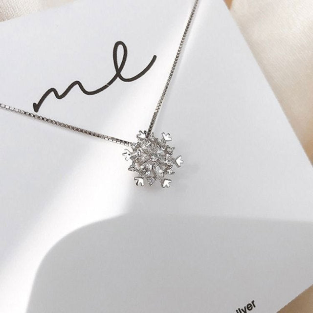 Crystal Necklace with Shimmering Snowflake in Gold and Silver